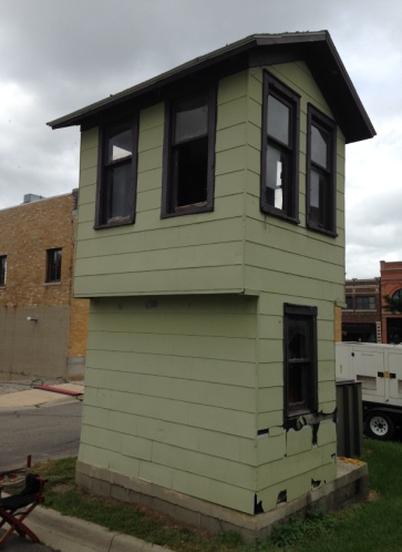 Before move, old asbestos siding